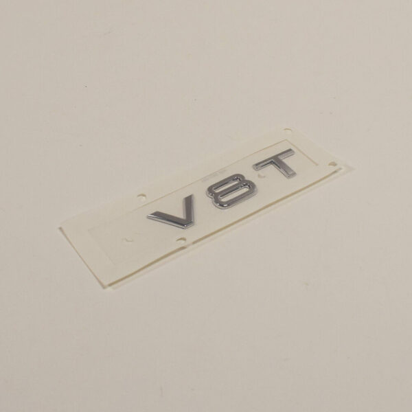 4H0853601 - NEW AUDI A8 4H FRONT BUMPER SIDE EMBLEM INSCRIPTION BADGE 4H0853601 2ZZ