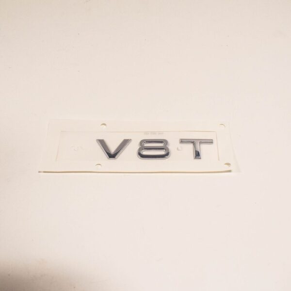 4H08536012ZZ - NEW AUDI A8 4H FRONT BUMPER SIDE EMBLEM INSCRIPTION BADGE 4H0853601 2ZZ ORIGINAL