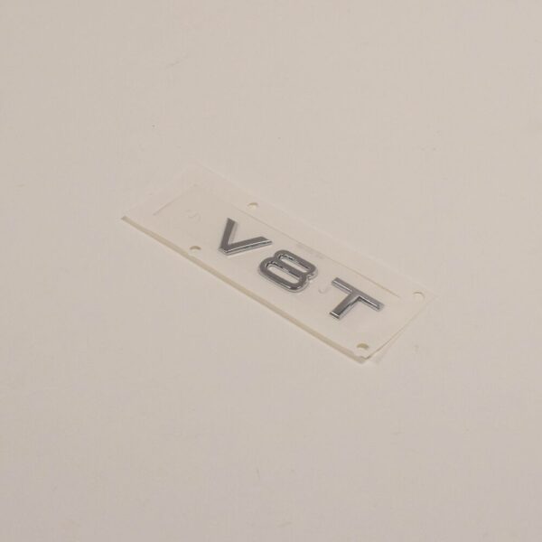 4H08536012ZZ - NEW AUDI A8 4H FRONT BUMPER SIDE EMBLEM INSCRIPTION BADGE 4H0853601 2ZZ ORIGINAL