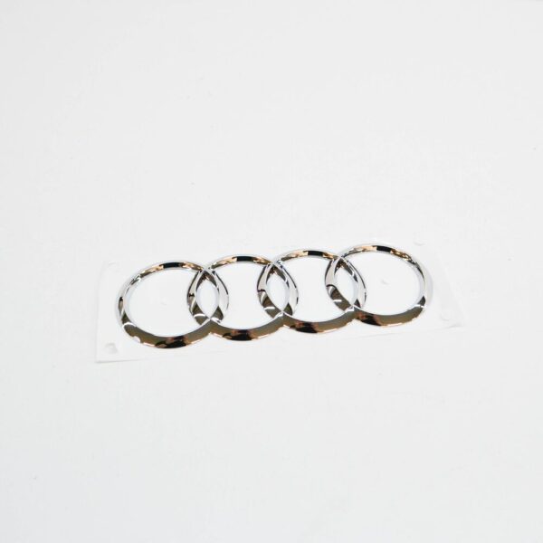 4H0853742A2ZZ - NEW AUDI Q5 8R REAR TRUNK RINGS EMBLEM BADGE 4H0853742A2ZZ ORIGINAL