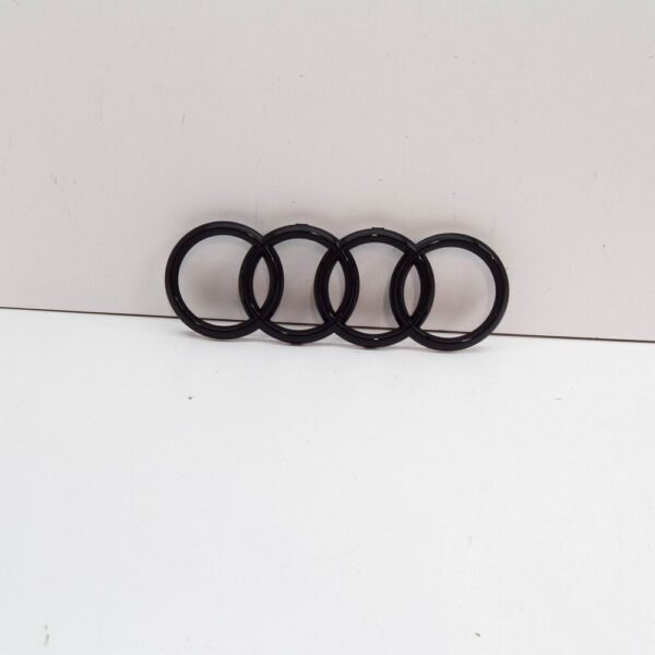 83A071801 - AUDI Q3 F3 FRONT RADIATOR GRILLE EMBLEM 83A071801 NEW GENUINE