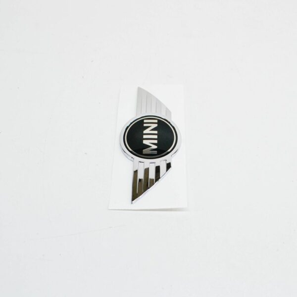 51147351370 - MINI CLUBMAN F54 emblem of the bonnet 51147351370 NEW REAL