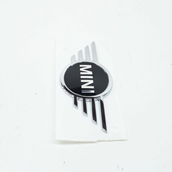 51149447807 - NEW OEM MINI COUNTRYMAN F60 FRONT HOOD EMBLEM 51149447807 GENUINE