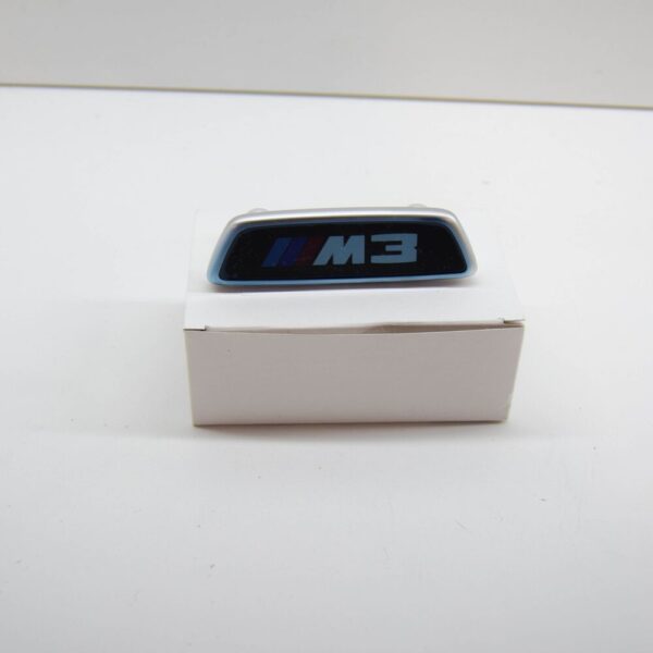 52108745043 - BMW 3 G80 M3 Competition Illuminated Seat Badge 52108745043 NEW GENUINE