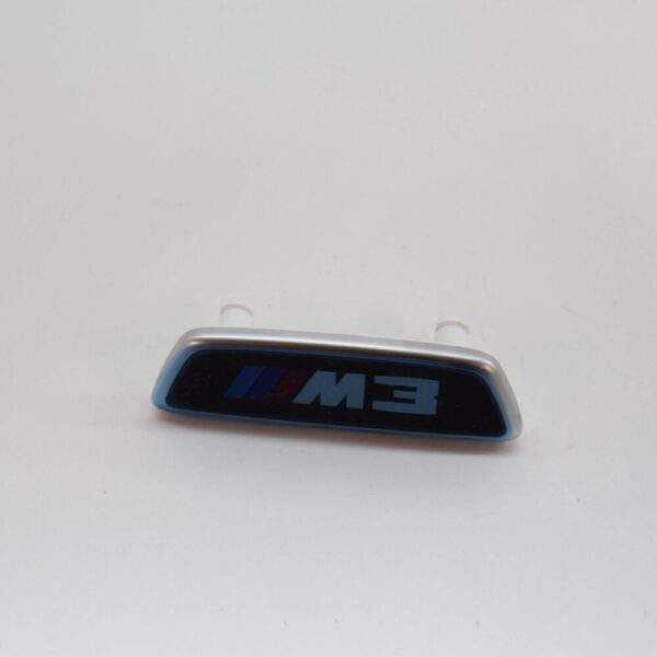 52108745043 - BMW 3 G80 M3 Competition Illuminated Seat Badge 52108745043 NEW GENUINE