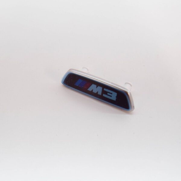 52108745043 - BMW 3 G80 M3 Competition Illuminated Seat Badge 52108745043 NEW GENUINE