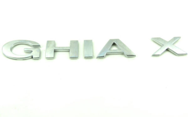 1132603 - NEW FORD MONDEO MK2 REAR TAILGATE GHIA X NAME PLATE BADGE EMBLEM 1132603