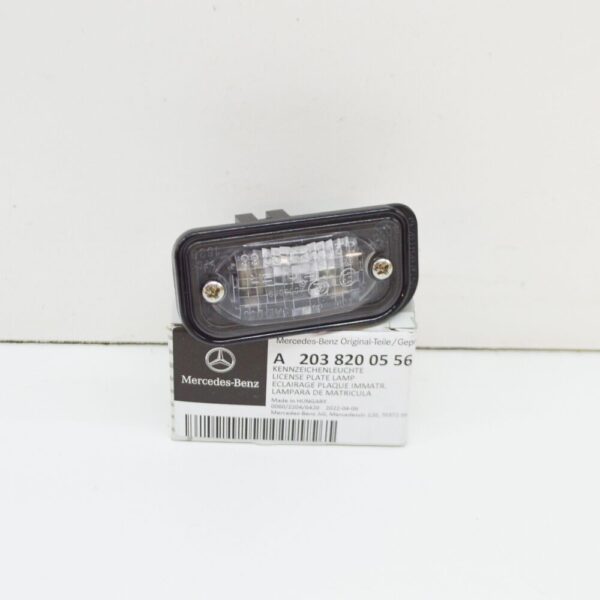 A2038200556 - Mercedes-Benz C W203 License Lamp Lens A2038200556 NEW GENUINE