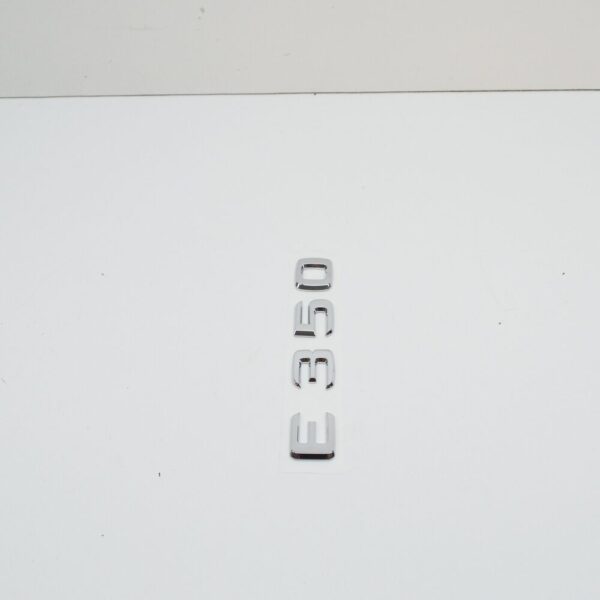 A2118170315 - NEW MB E C207 REAR TRUNK EMBLEM BADGE A2118170315 ORIGINAL