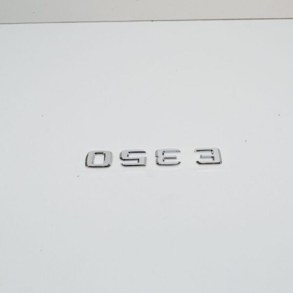 A2118170315 - NEW MB E C207 REAR TRUNK EMBLEM BADGE A2118170315 ORIGINAL