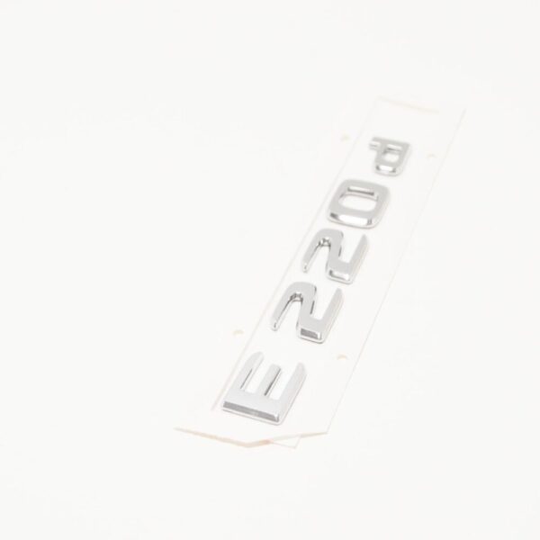 A2138175700 - NEW MERCEDES-BENZ E-CLASS W213 REAR EMBLEM BADGE A2138175700 ORIGINAL