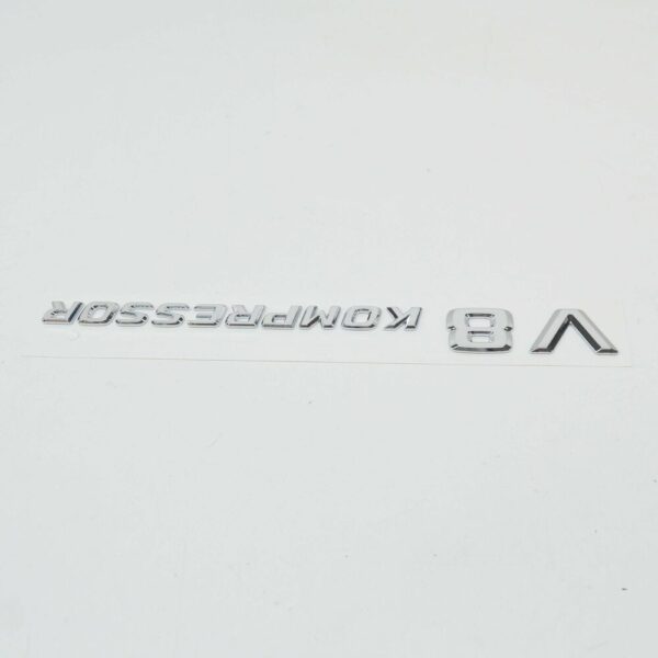 A2308170515 - NEW MERCEDES-BENZ SL R230 V8 KOMPRESSOR FENDER BADGE A2308170515 ORIGINAL