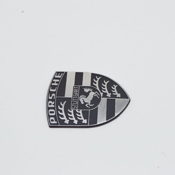 92811040300 - Porsche 928 Intake Air Distributor Crest Emblem 92811040300 NEW GENUINE