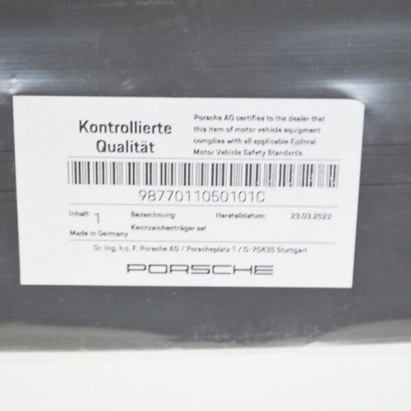 9877011050101C - Porsche Cayman 987 license plate holder front 9877011050101C NEW ORIGINAL