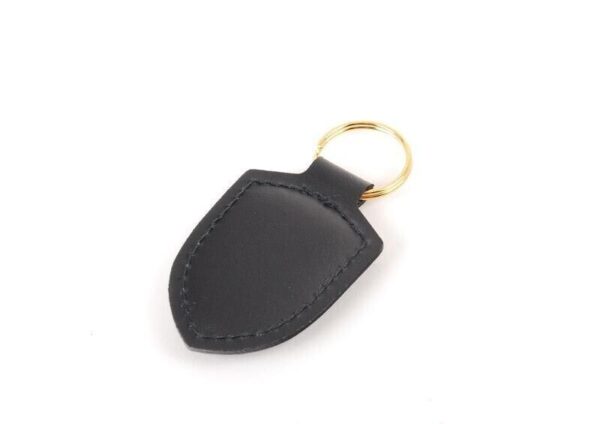 WAP0500900E - Porsche Leather Keychain Emblem Black Crest Genuine WAP0500900E