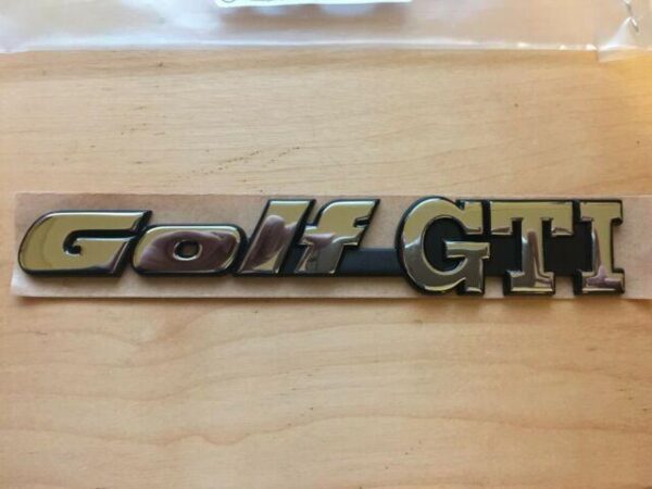 1H6853687ADZ10 - VW Golf Mk3 original rear emblem 1H6853687ADZ10