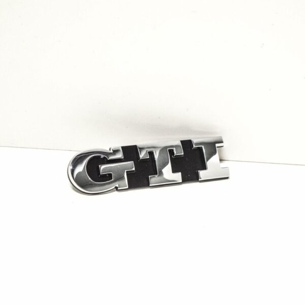 1K6853679DFXC - NEW VOLKSWAGEN GOLF MK6 GTI COOLER GRILLE EMBLEM 1K6853679DFXC OEM