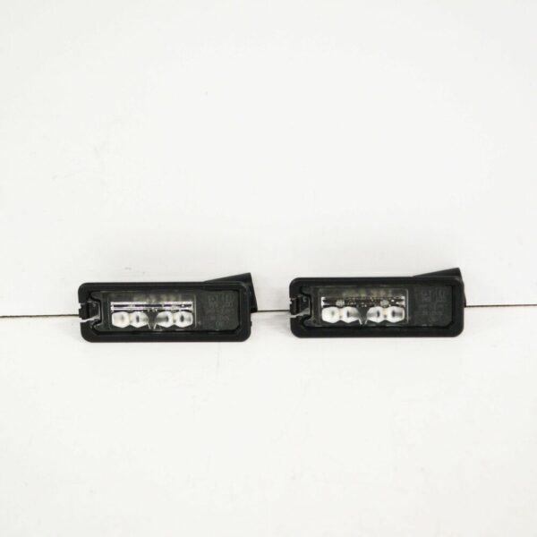 1K8943021D - NEW EOS REAR LICENSE PLATE LIGHT SET 1K8943021D GENUINE