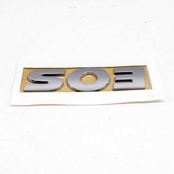 1Q0853687C739 - VW EOS High Chrome EOS Lettering 1Q0853687C739, NEW, ORIGINAL