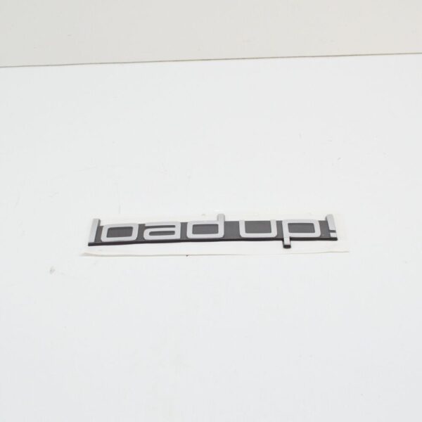1S6853687C - Volkswagen UP Rear Load Up Emblem Badge 1S6853687CDPJ NEW