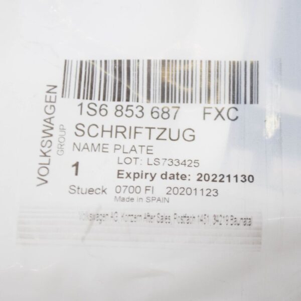 1S6853687FXC - Volkswagen UP Rear Emblem Badge 1S6853687FXC NEW GENUINE