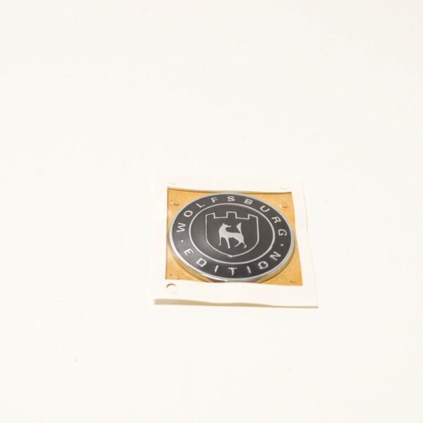 561853688DYMS - Volkswagen CC Wolfsburg badge emblem rear lid 561853688DYMS new
