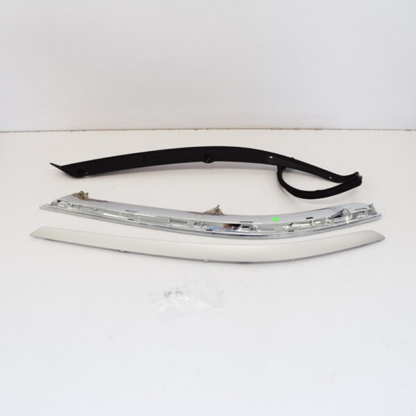 561998119 - NEW VW PASSAT B8 LEFT SIDE OF HEADLIGHT-561998119 TRIM ORIGINAL