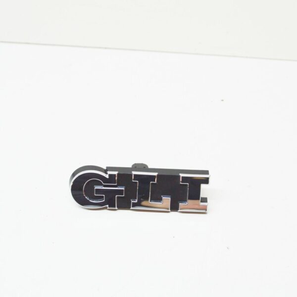 5C6853679739 - NEW VW JETTA A6 MK6 FRONT RADIATOR GRILLE INSCRIPTION BADGE 5C6853679739