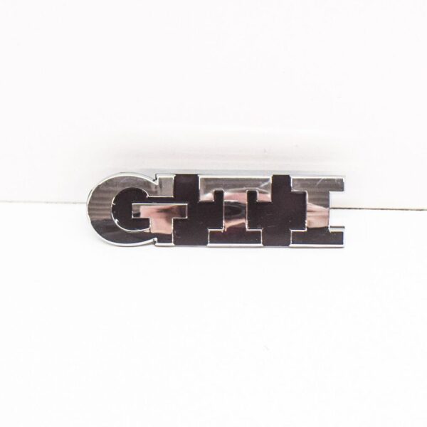 5G0853679AFDPJ - NEW VW GOLF MK7 GTI FRONT BUMPER RADIATOR GRILL EMBLEM 5G0853679AF DPJ ORIGINAL