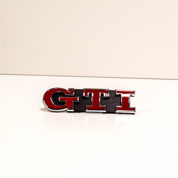 5G0853679PWYR - Volkswagen Golf Mk7  GTI Grill Badge Emblem 5G0853679PWYR NEW GENUINE