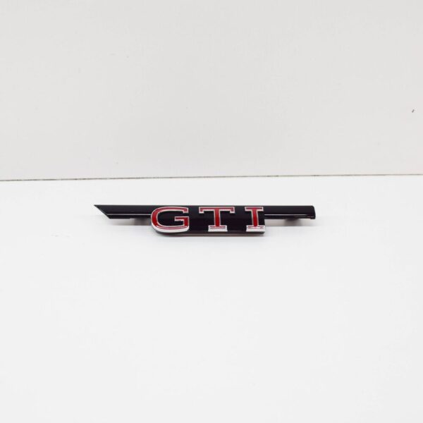 5H0853679M - VW GOLF MK8 radiator grille 'GTI' inscription 5H0853679MKRR NEW GENUINE