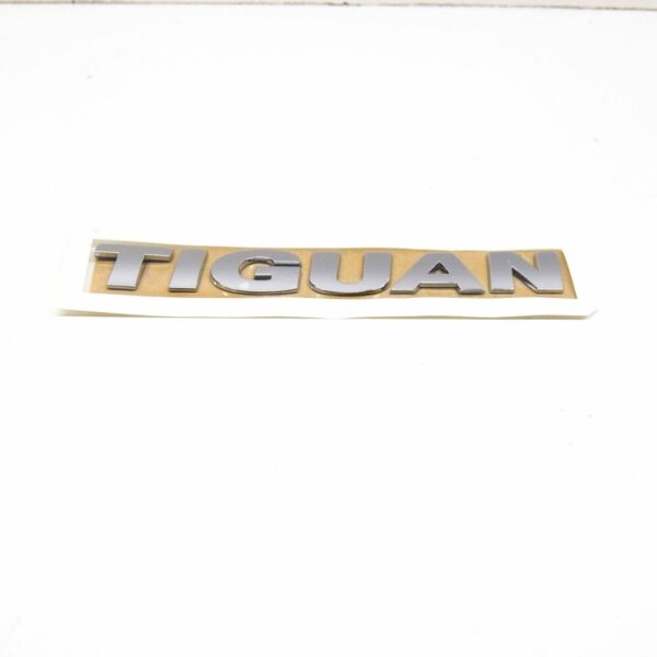 5N0853687B739 - NEW VW TIGUAN MK1 REAR TRUNK LID CHROME EMBLEM BADGE 5N0853687B739