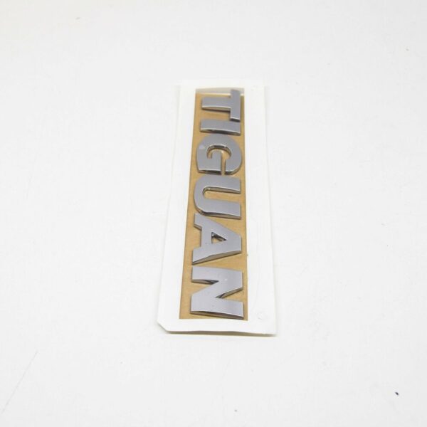 5N0853687B739 - NEW VW TIGUAN MK1 REAR TRUNK LID CHROME EMBLEM BADGE 5N0853687B739