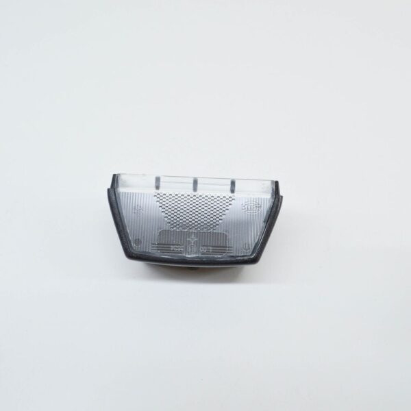 7F0943111 - NEW VOLKSWAGEN TRANSPORTER T5 NUMBER PLATE LIGHT HOLDER TRIM 7F0943111 ORIGINAL