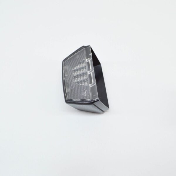 7F0943111 - NEW VOLKSWAGEN TRANSPORTER T5 NUMBER PLATE LIGHT HOLDER TRIM 7F0943111 ORIGINAL