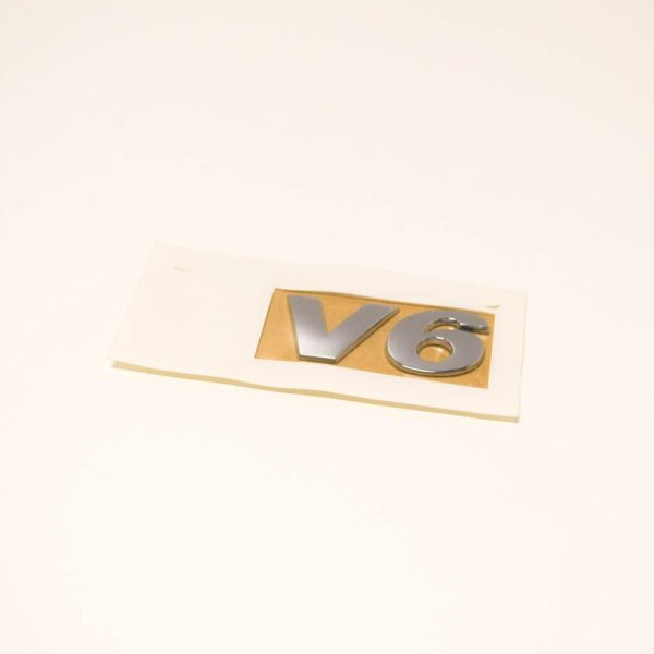 7P6853675E739 - VW TOUAREG 7P tailgate emblem 7P6853675E739 NEW